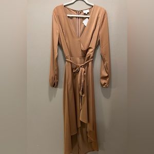 MYSTIC. Gold dress with tie belt.